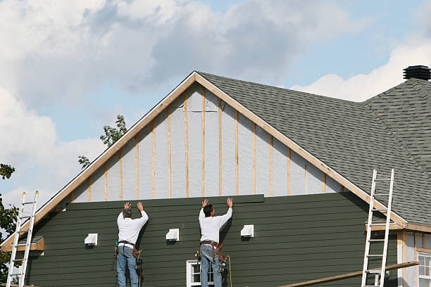 Professional Siding Installation technician working in West Point, NY